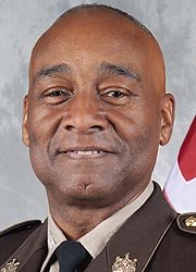 [photo, Michael A. Jackson, Acting Secretary of State Police]